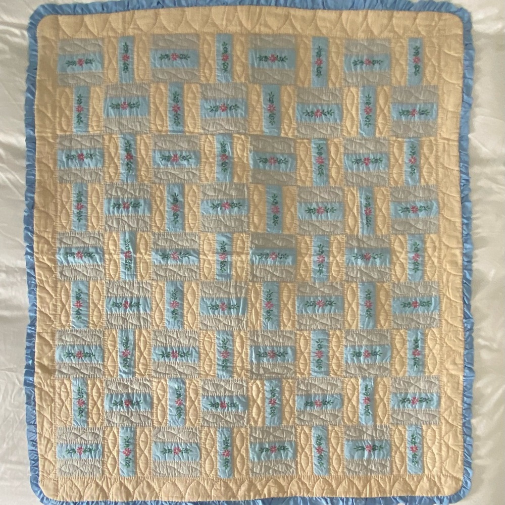 Handmade pieced and embroidered baby quilt